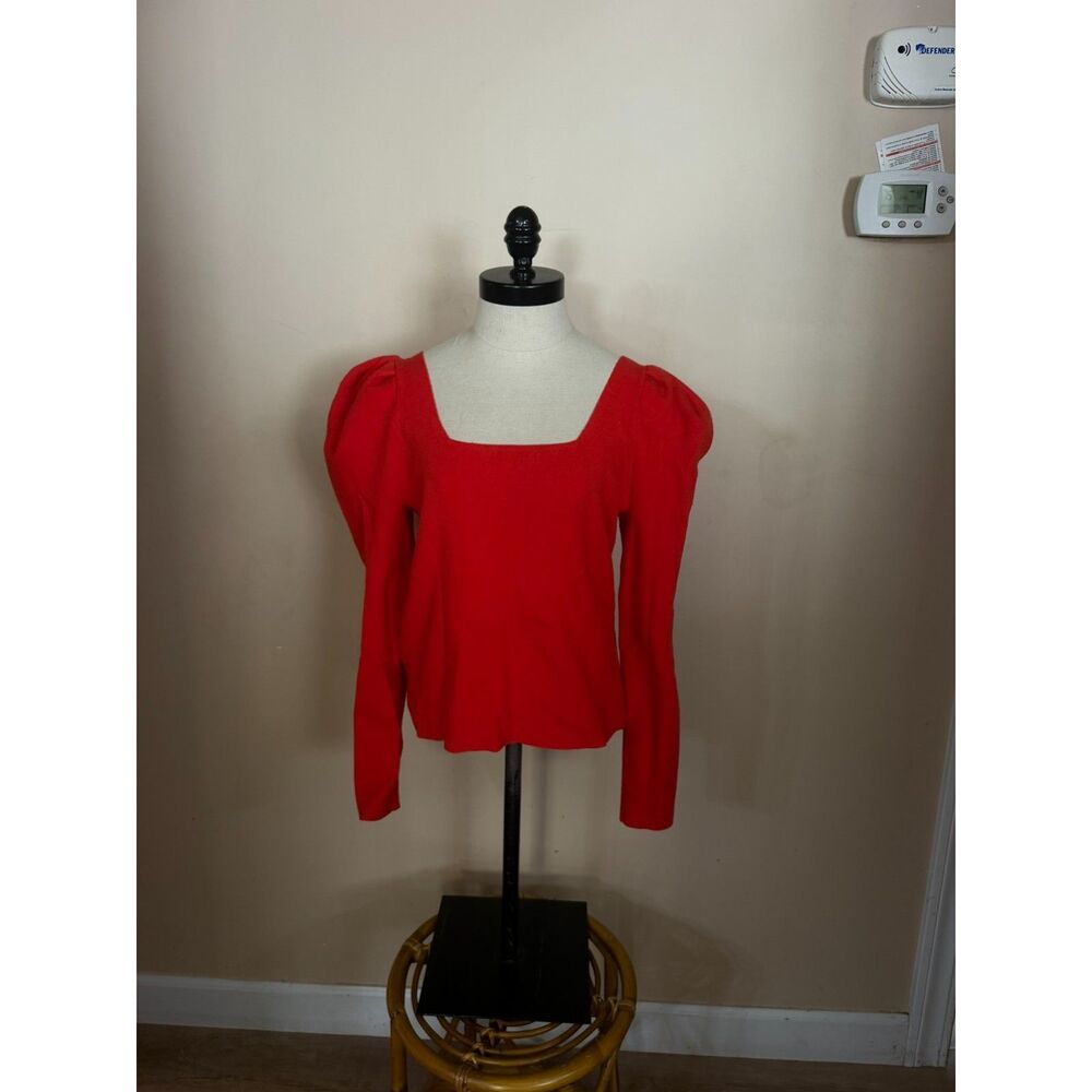 Womans red puff shoulder long sleeve top